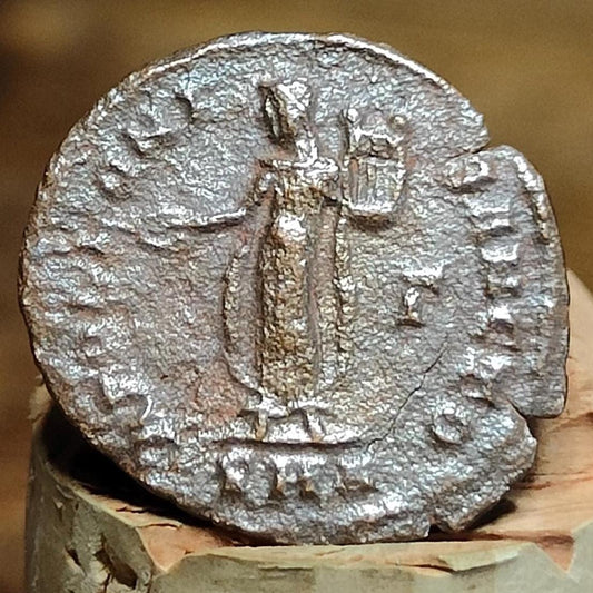 Christian persecution issue roman coin featuring Apollo and Genius - VPUKcoins