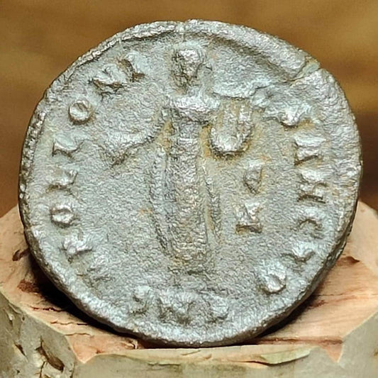 Christian persecution issue roman coin featuring Apollo and Genius - VPUKcoins