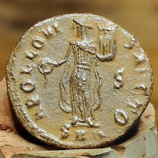 Christian persecution issue roman coin featuring Apollo and Genius, 310-313AD - VPUKcoins