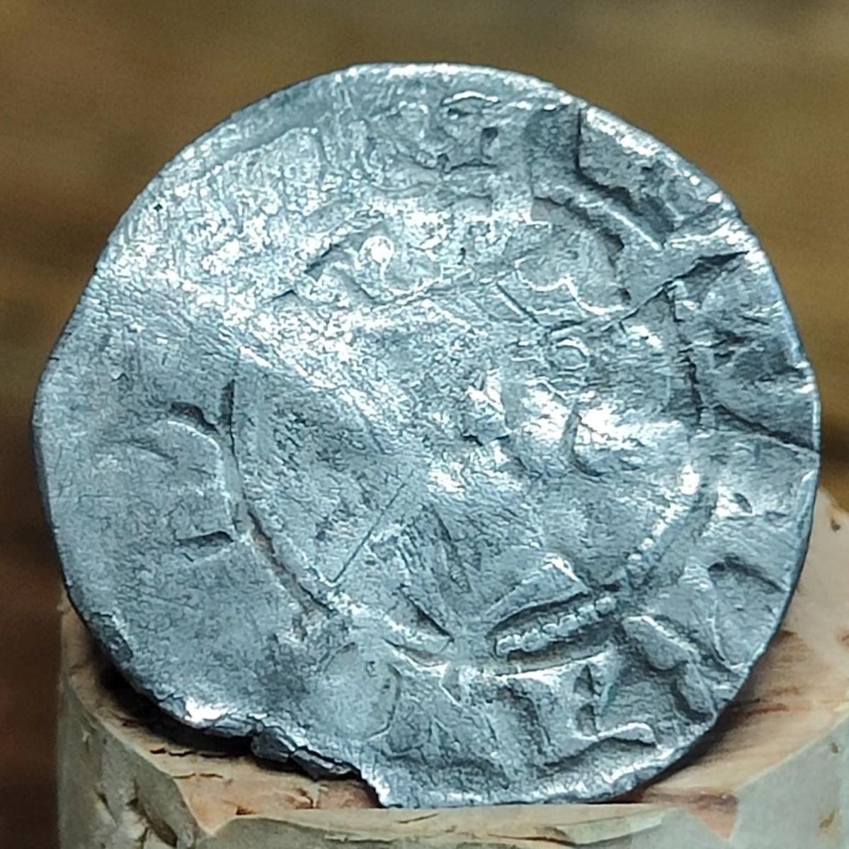 Medieval hammered silver penny coin of King Edward I, 700 years old