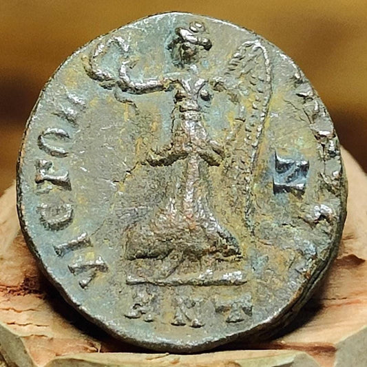 Christian persecution issue roman coin featuring Jupiter and Victory