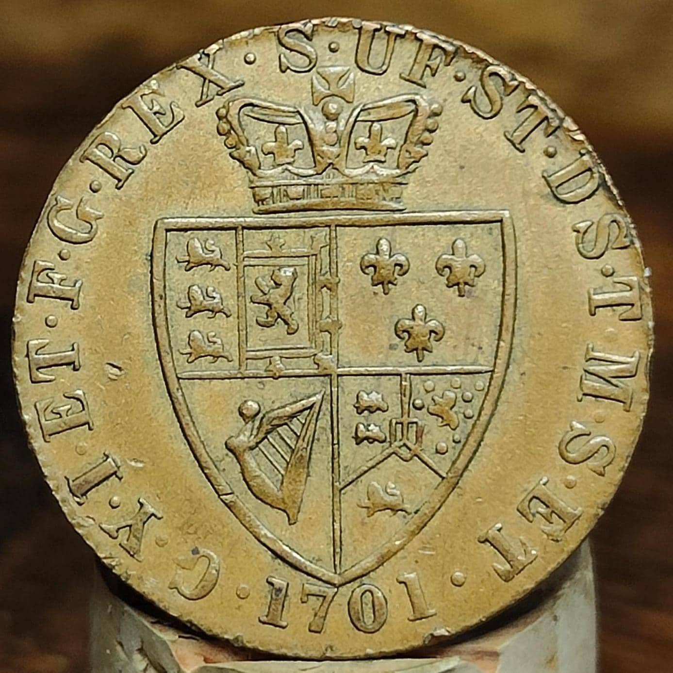 George III spade Guinea gaming token, dated 1701, Georgian brass jetton