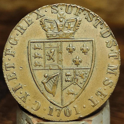 George III spade Guinea gaming token, dated 1701, Georgian brass jetton