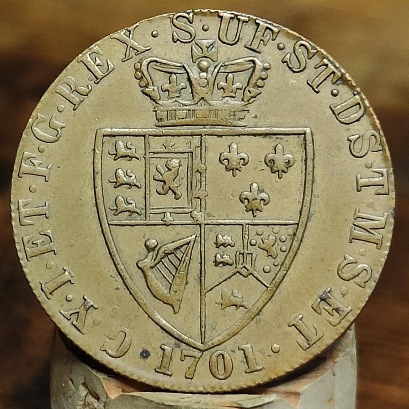George III spade Guinea gaming token, dated 1701, Georgian brass jetton