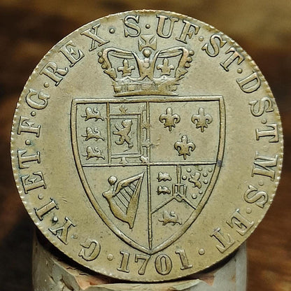 George III spade Guinea gaming token, dated 1701, Georgian brass jetton