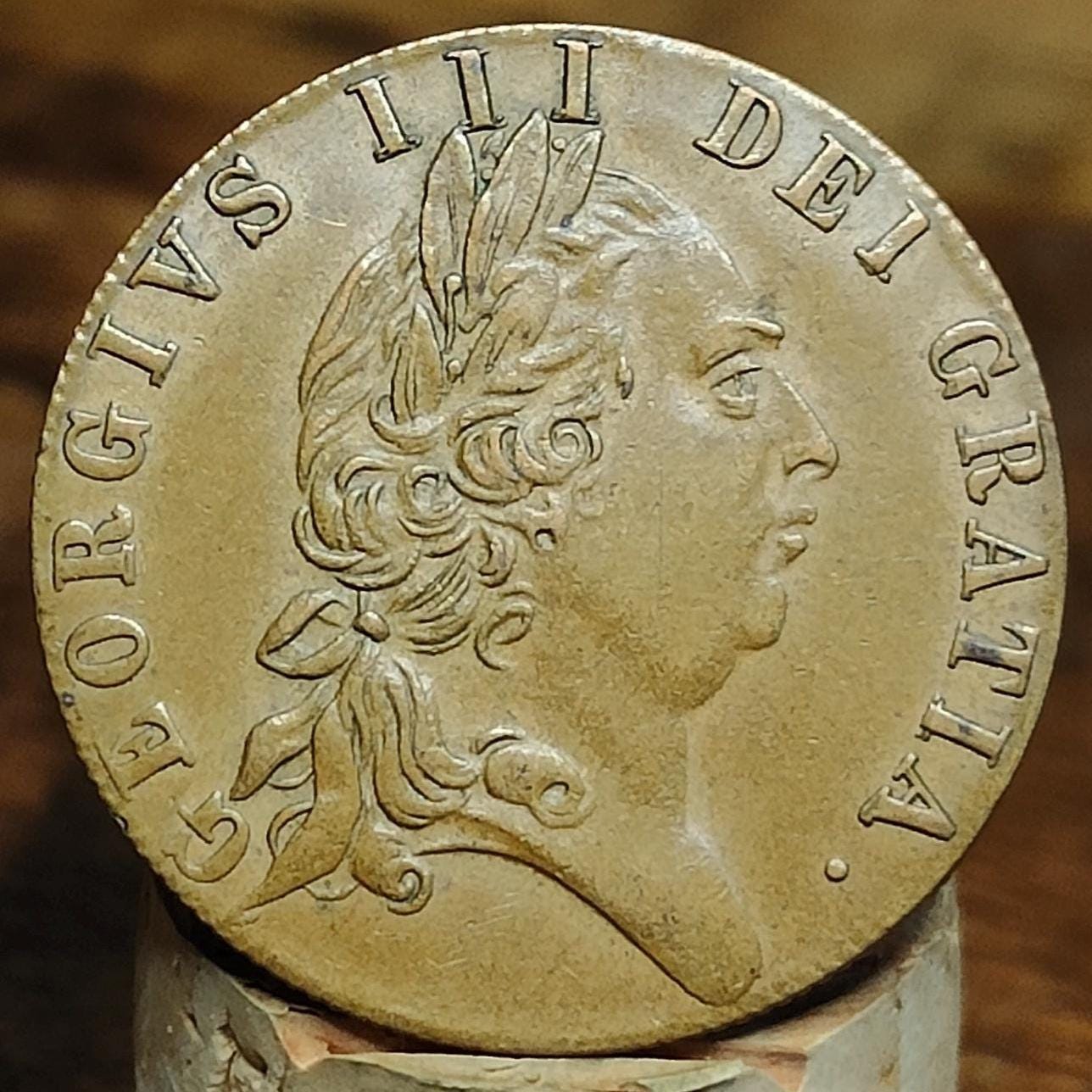 George III spade Guinea gaming token, dated 1701, Georgian brass jetton