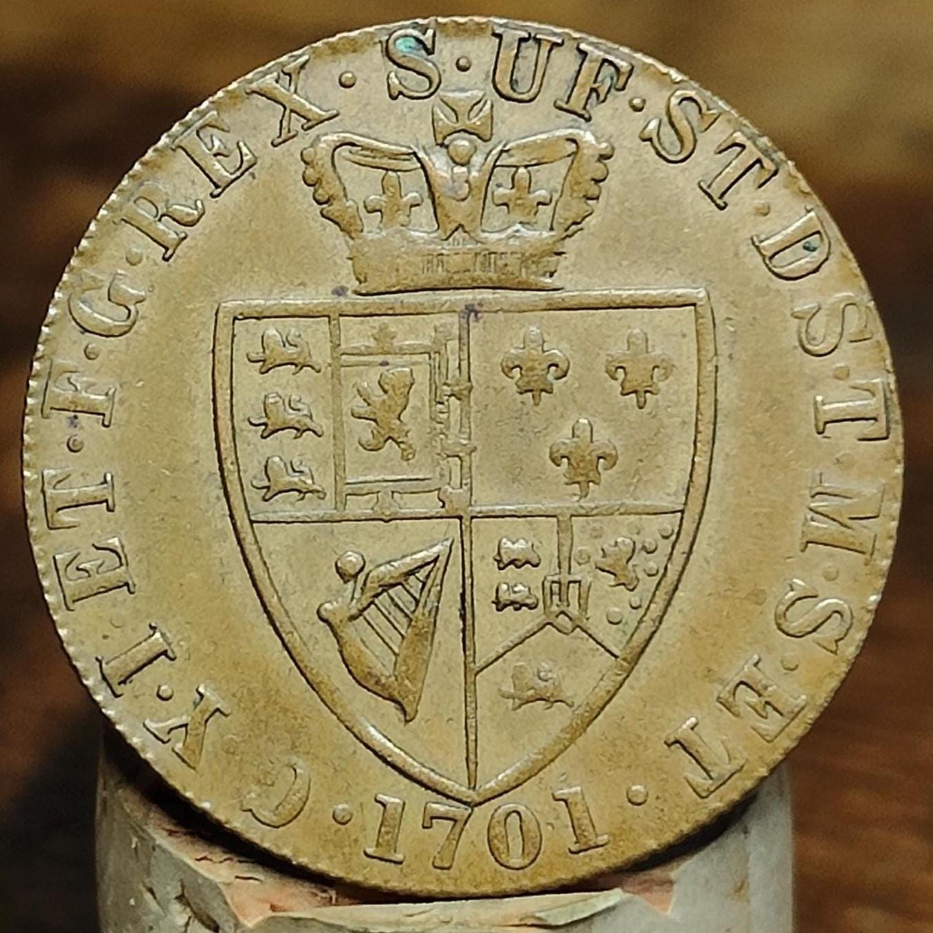 George III spade Guinea gaming token, dated 1701, Georgian brass jetton