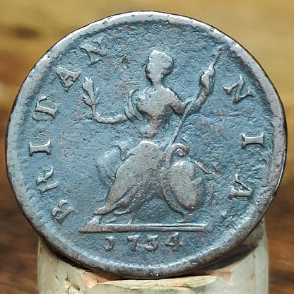 George II Farthing, dated 1734 - Georgian/ US colonial coin