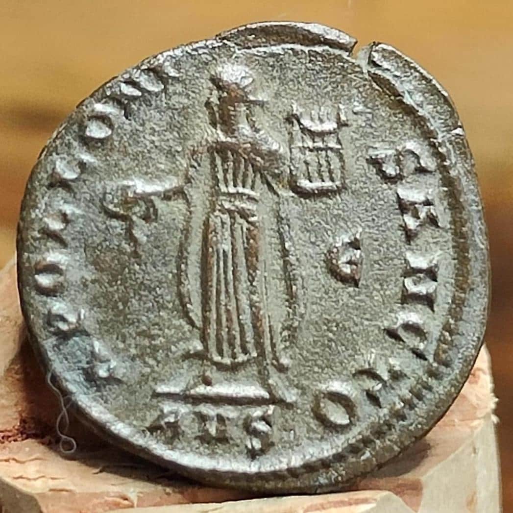 Christian persecution issue roman coin featuring Apollo and Genius, 310-313AD, anonymous civic coinage
