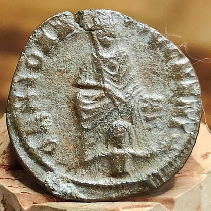 Christian persecution issue roman coin featuring Apollo and Genius, 310-313AD, anonymous civic coinage