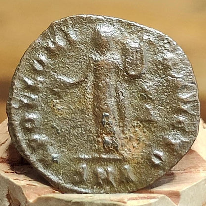 Christian persecution issue roman coin featuring Apollo and Genius, 310-313AD, anonymous civic coinage