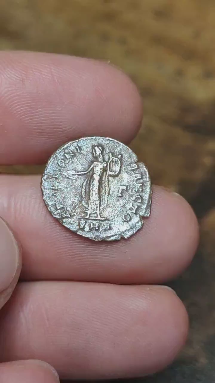 Christian persecution issue roman coin featuring Apollo and Genius